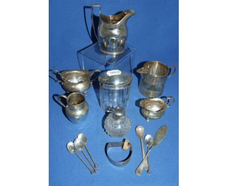 A Victorian silver cream jug, London 1886, 7.5 cm high, five silver and enamel spoons, silver and other items, approx 17.3 oz