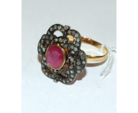 A 14ct yellow gold, ruby and old cut diamond cluster ring