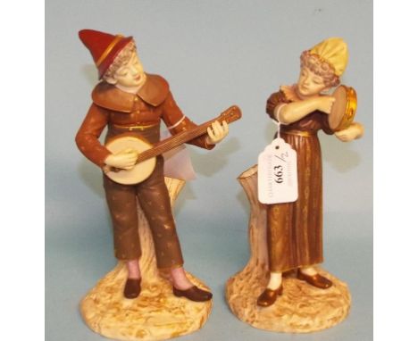 A pair of Worcester porcelain figures, of musicians, 1032, green puce marks to base (restored), the largest 21.5 cm high