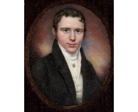 A 19th century oval bust portrait miniature, of a gentleman wearing a frock coat, white cravat and green stock pin, watercolo