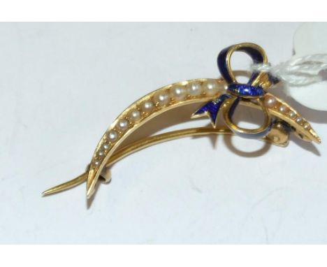 A yellow coloured metal, seed pearl and blue enamel crescent shaped brooch Condition report Report by NG

Total weight approx