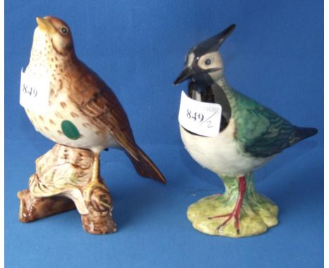 A Beswick Lapwing, 1st version, 2416A, and a Songthrush, 2308, both gloss (2) Condition report Report by NG

Lapwing: undergl