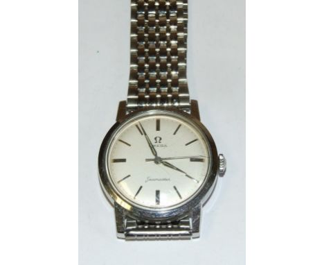 A gentleman's stainless steel Omega Seamaster, with centre seconds, and associated mesh bracelet, cased Condition report Repo