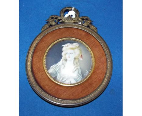 A circular bust portrait of a lady wearing ribbons in her hair, watercolour, indistinctly signed, 6 cm diameter