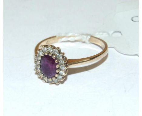 A 9ct gold, amethyst and diamond cluster ring