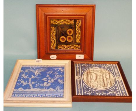 A Victorian pottery tile and two others, all framed (3)