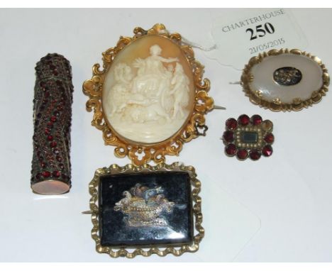 A cameo brooch, a micro mosaic brooch (a.f.) two other brooches, and a needlecase, set garnets Condition report Report by NG
