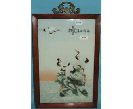 A Chinese porcelain plaque, decorated birds on a branch, signed, 37 x 23.5 cm Condition report Report by NG

Inset of frame a