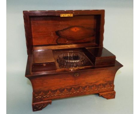 A Victorian rosewood tea caddy, of sarcophagus form, with Gothic style carved decoration, 33 cm wide   Condition report Repor