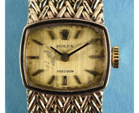 A lady's 9ct gold Rolex Precision wristwatch, with integral bracelet and baton indices, boxed  See illustration Condition rep