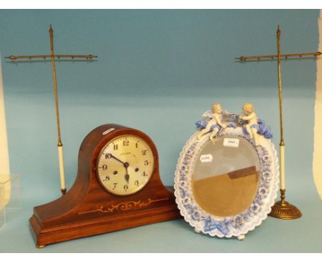 An inlaid mantel clock, a pair of table screen stands, and a Sitzendorf style strut mirror (4)