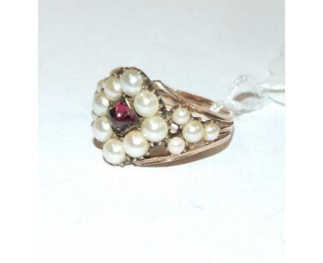 A 19th century yellow coloured metal, seed pearl and cabochon garnet ring Condition report Report by NG

Approx. total weight