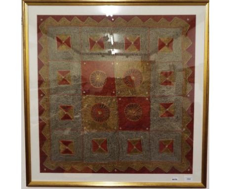 An embroidered panel, of geometric motifs, 72 cm square 