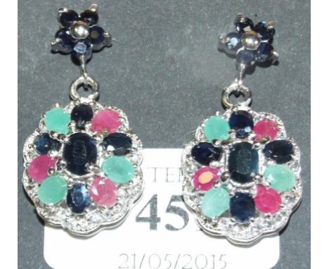 A pair of silver, ruby, emerald and sapphire cluster earrings