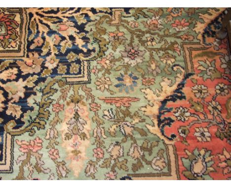 A Persian style machine made carpet, 417 x 315 cm