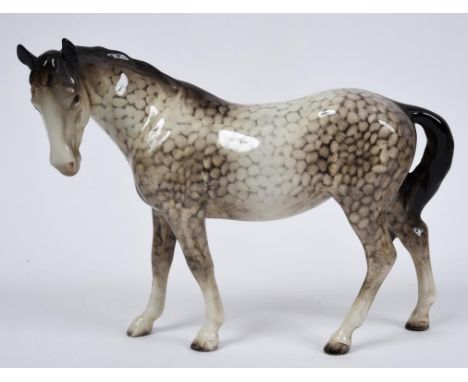 A Beswick Mare, facing left, rockinghorse grey, 976, gloss (minor nibbles to one hoof)  See illustration Condition report Rep