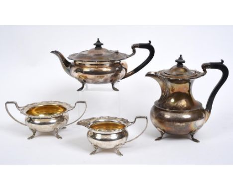 A silver four piece tea and coffee service, with a wavy rim, and pad feet, Elkington & Co, Birmingham 1925, approx. 59.4 ozt 