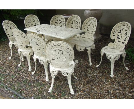 A set of six cream painted garden chairs, a matching triple chair back garden bench, and a table (8) Condition report Report 