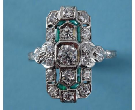 An Art Deco style platinum, diamond and emerald panel ring  See illustration Condition report Report by NG

Approx. ring size