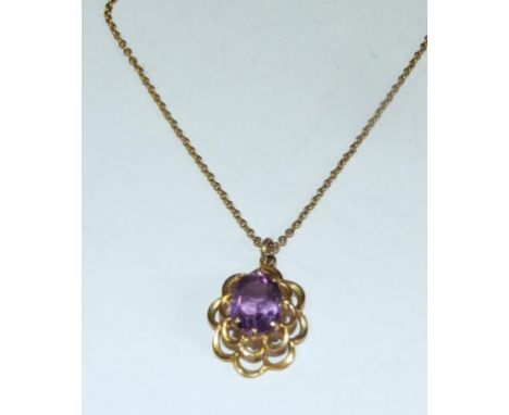 An amethyst pendant, on a chain