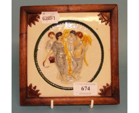 A Prattware style tile, decorated the four seasons, 13 cm wide, framed
