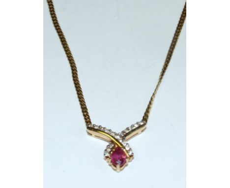 A 14ct gold ruby and diamond necklace, cased