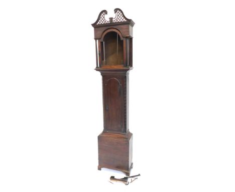 A late 18th/early 19thC mahogany longcase clock case, with later fret work swan neck pediment, above an arched door to the tr