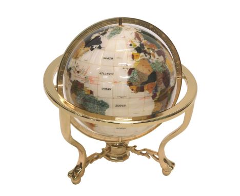 An Icyy Co Limited gemstone globe, with polished brass stand, 45cm wide, with original packaging. 