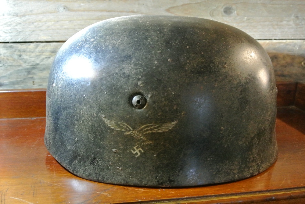 MILITARIA A WW2 German Paratrooper helmet with original leather liner