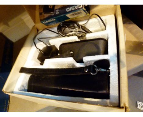PHONE AND TV. Early Motorola mobile phone and Casio hand held TV