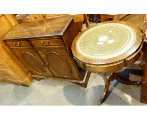 MIXED TABLES. Circular leather topped drinks table with tripod base and a dark wooden hall cupboard with inlay, twin drawers 