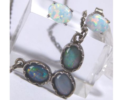 OPAL EARRINGS & PENDANT. Silver set opal earrings and an opal pendant