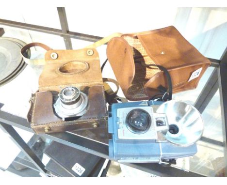 CAMERAS. Falcon camera in leather case and a Brownie Flash 20 camera in case