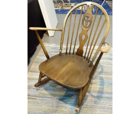 ERCOL ROCKER. Ercol rocking chair with Prince of Wales feathers design