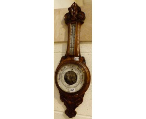 BAROMETER THERMOMETER. Oak cased barometer thermometer