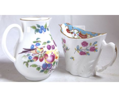 ROYAL WORCESTER CREAM JUGS. Two small Royal Worcester cream jugs