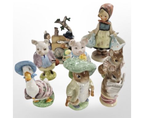 A group of Beswick Beatrix Potter figurines and two Goebel figurines.