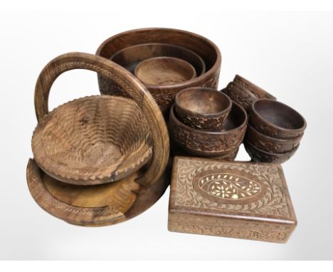 A quantity of carved hardwood Indian bowls, bone-inlaid trinket box, collapsible basket, etc. (1 box)