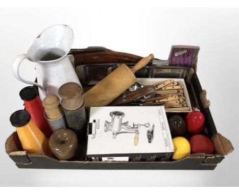 A quantity of Scandinavian kitchen wares including cutlery, mincer, enamelled jug, rolling pin, serving platters, etc. (1 box