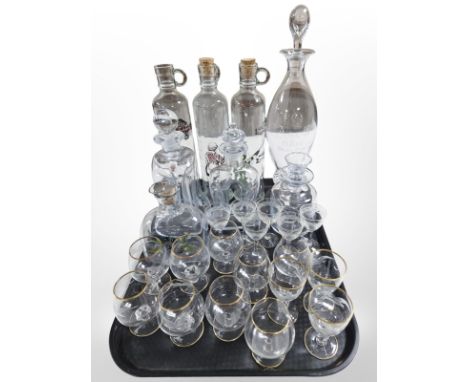 A collection of Scandinavian glass decanters include Holmegaard, various gilt-rimmed drinking glasses, etc.