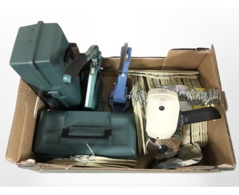 A large quantity of coat hangers, Katsu cutting machine, two stud pressing tools etc (1 box)