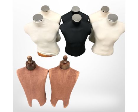 Eight various mannequin torsos 