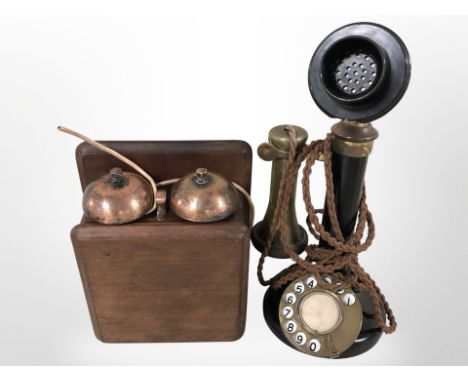 A Bakelite candlestick telephone with GPO bell box.