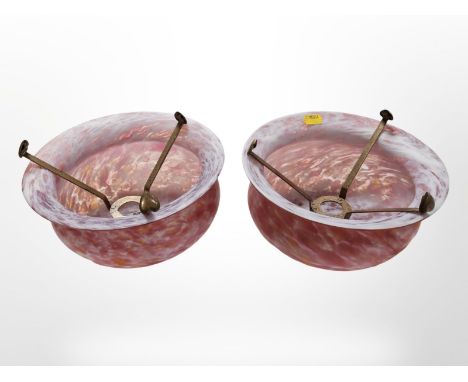 A pair of Art Deco mottled pink glass light shades, diameter 23cm.