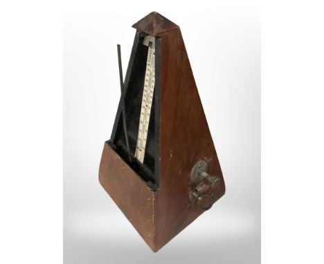 A Victorian walnut metronome, height 23 cm