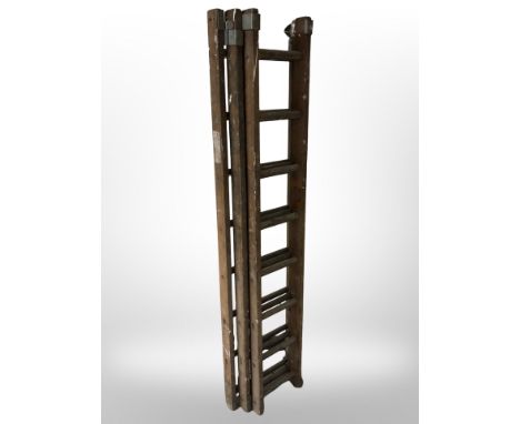 A wooden extending ladder 