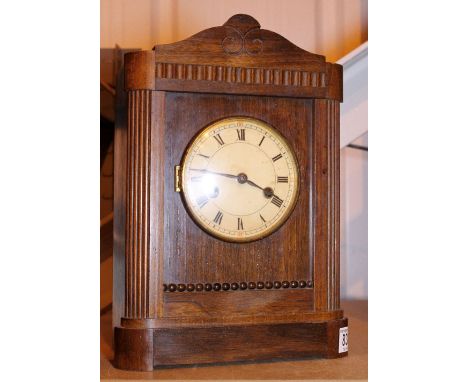 CHIMING CLOCK. Mahogany cased chiming clock with key and pendulum 