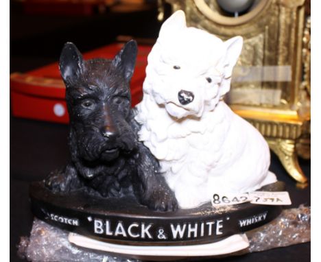 ADVERTISING ITEMS. Daily Post ceramic dish and a black & white whisky advertising sign