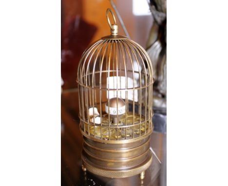 BIRD CAGE CLOCK. Brass bird cage clock