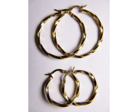 9 CT GOLD EARRINGS. Two large and two medium pairs of 9 ct gold earrings CONDITION REPORT: The weight of this item is approxi